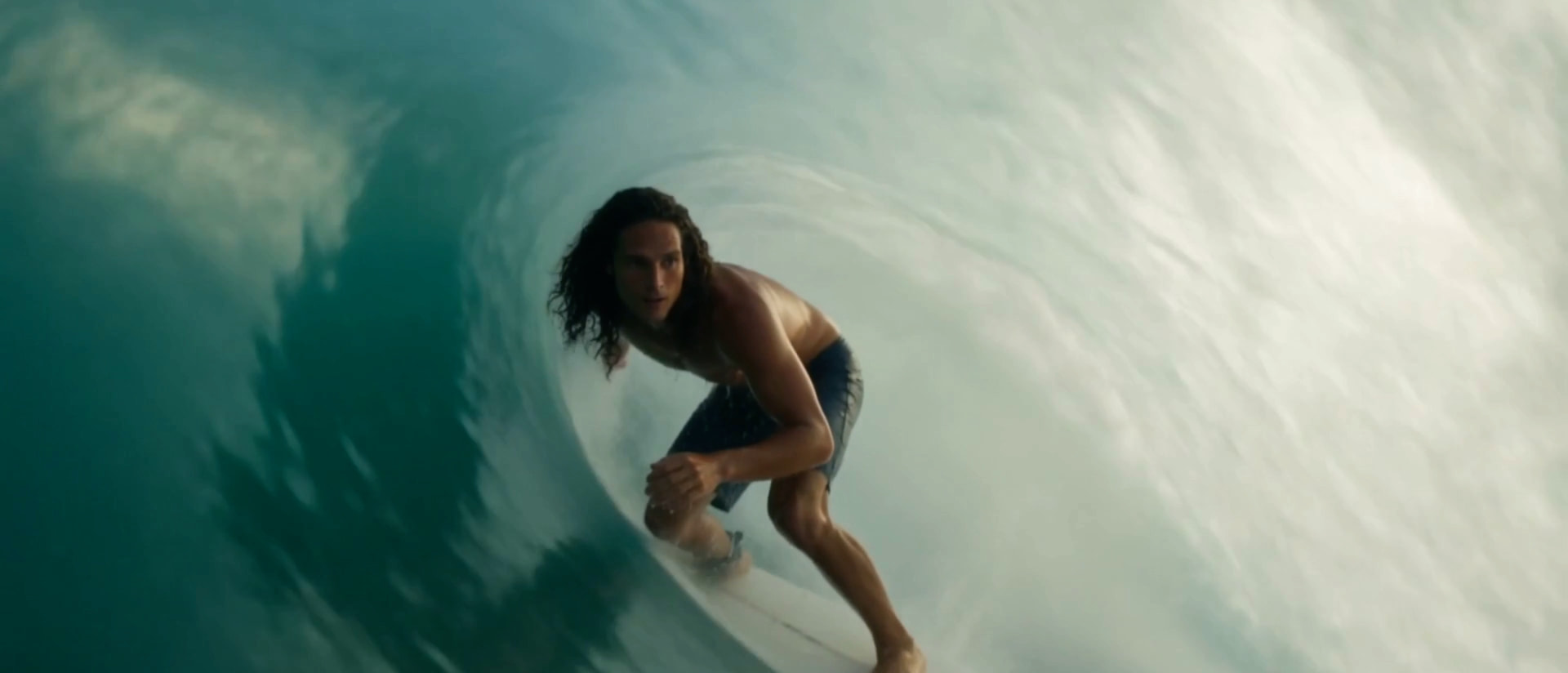 Surfer inside a wave